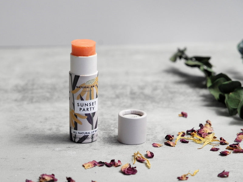 Natural Orange Tinted Lip Balm in zero waste paper tube. Essential oils scented Eco-friendly Lip Balm.